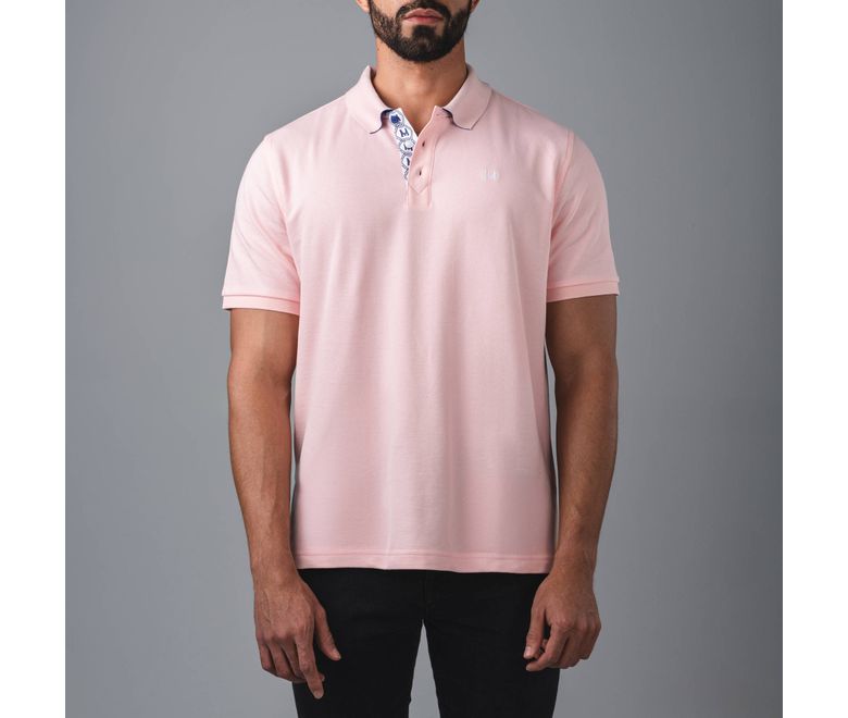 camiseta-polo-insignia-rosado-tierra-arriba_1